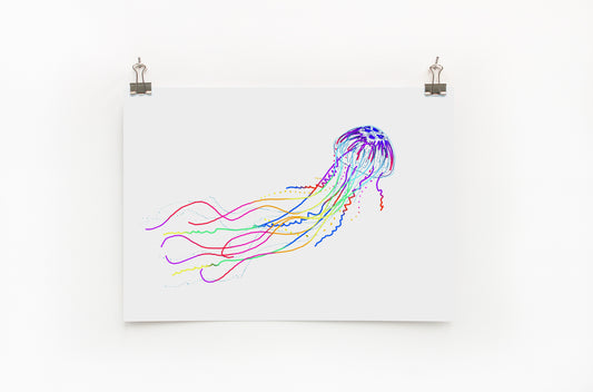 A digital print of a colorful jellyfish on a white background, displayed on a wall.