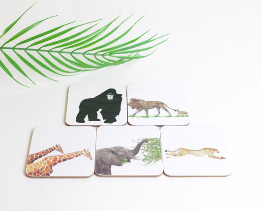 A set of animal-themed coasters including depictions of a lion, gorilla, elephant, and giraffe.