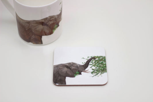 A coaster featuring an illustration of an elephant with leaves on its trunk, part of the Africa collection.
