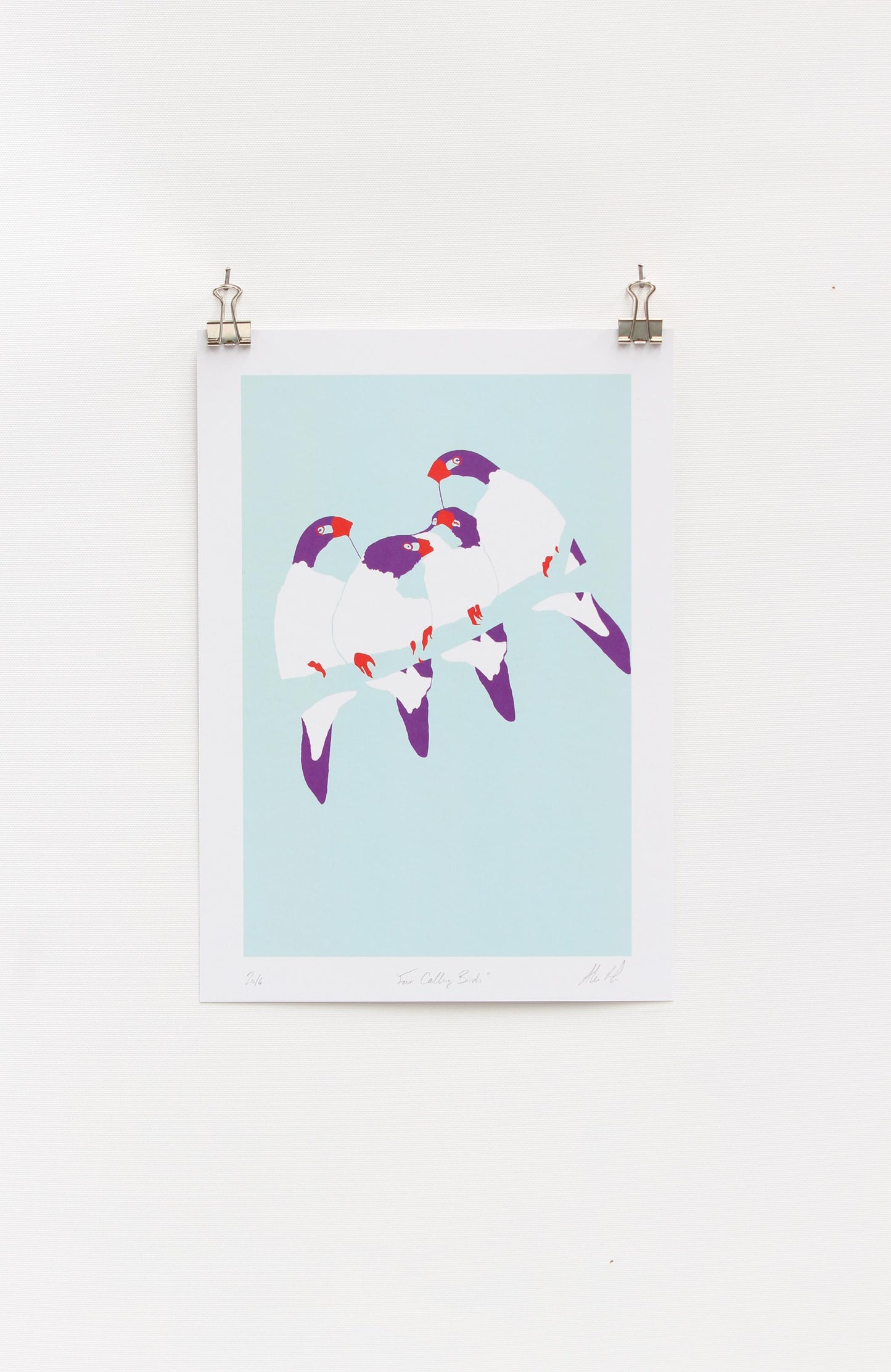 A digital print featuring a minimalist design of four colorful birds resting on a tree branch, signed by Rolfe And Wills.