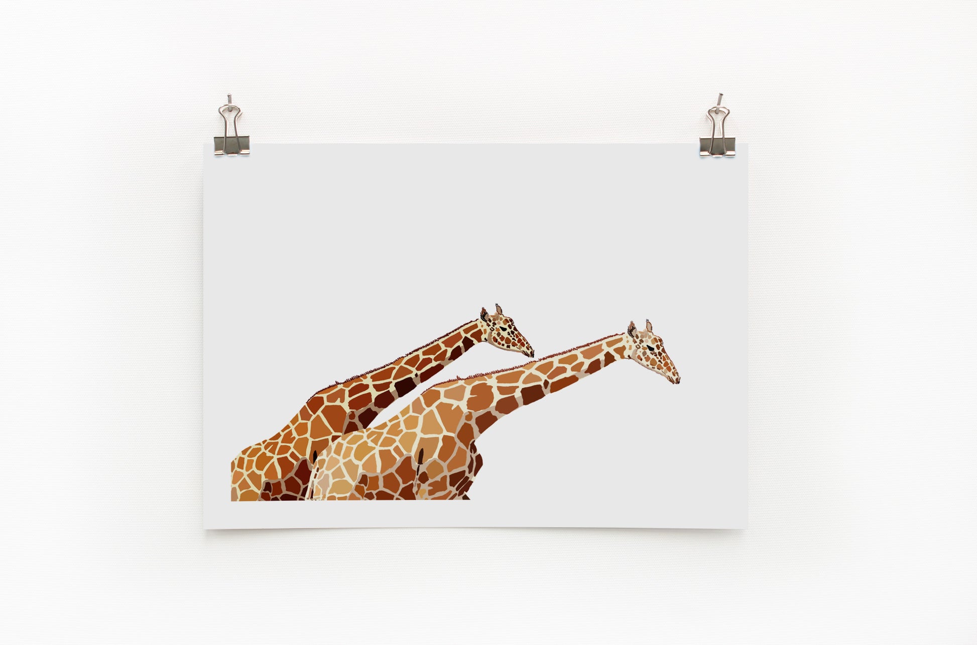 A digital print of two giraffes reaching their long necks across the paper, displayed on a white wall.