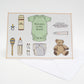 A greeting card with illustrations of a babygrow, a teddy bear, a pacifier, and other baby-related items arranged neatly on the front.