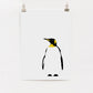 A framed digital print of an elegant penguin looking into the distance, predominantly in white, yellow, and black colors.
