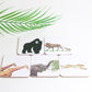 A set of animal-themed coasters including depictions of a lion, gorilla, elephant, and giraffe.