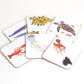 A set of six coasters, each featuring a colorful illustration of various underwater animals, such as jellyfish, an octopus, a blue whale with a calf, a shoal of goldfish, a lobster, and a turtle with a clownfish.