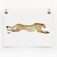 A digital print of a cheetah sprinting across a plain background, signed by the artist.