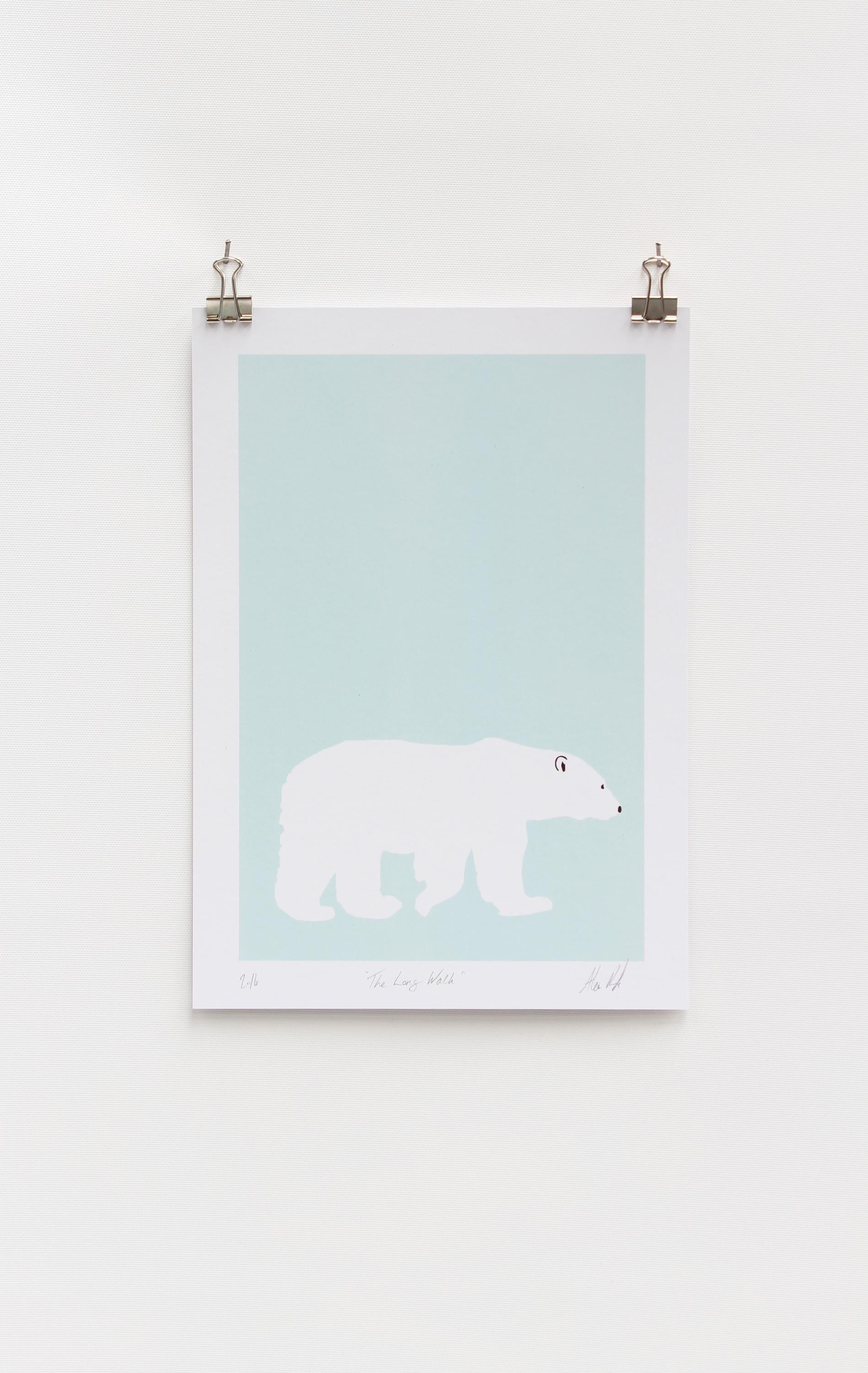 A digital print featuring a lone polar bear on a light blue background, mounted on a wall.