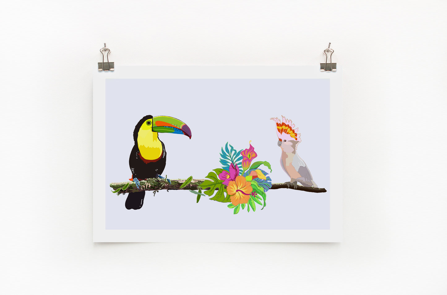 A digital print featuring a colorful illustration of a toucan and a cockatoo with surrounding tropical flowers, displayed on a wall.
