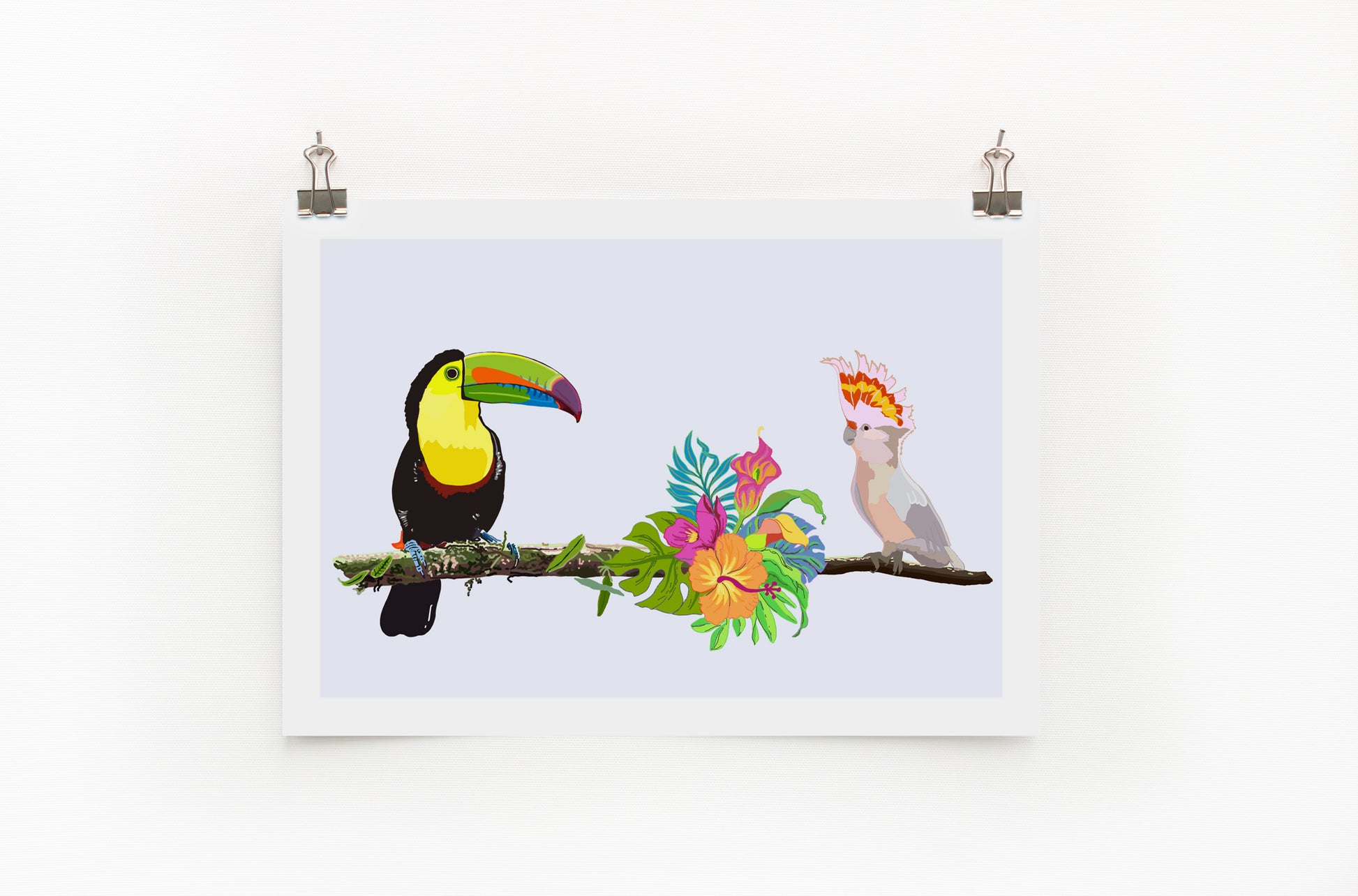 A digital print featuring a colorful illustration of a toucan and a cockatoo with surrounding tropical flowers, displayed on a wall.